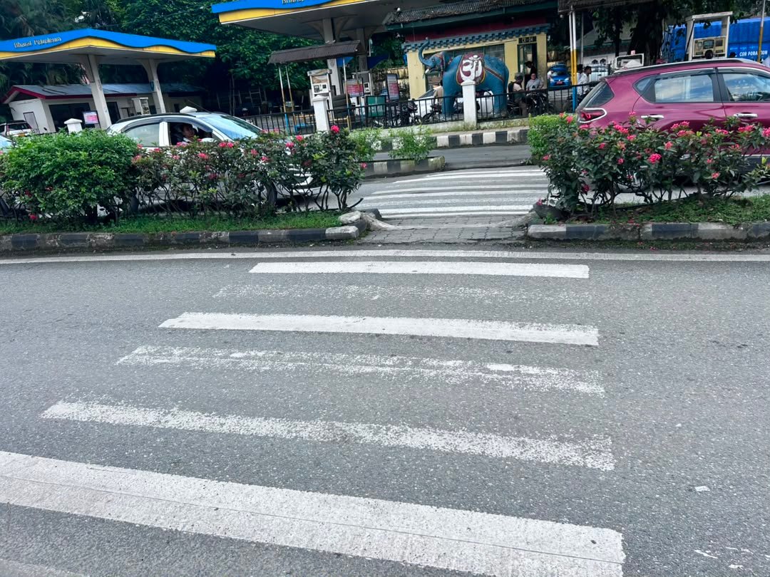 Crosswalk near the gate with a petrol station